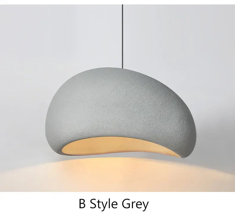 Grey modern pendant lamp with curved design, ideal for dining rooms and home decor.