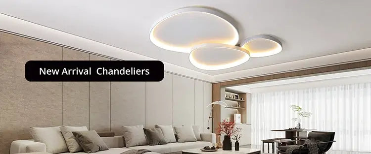 Modern circular LED chandelier illuminating a stylish living room with minimalist decor.