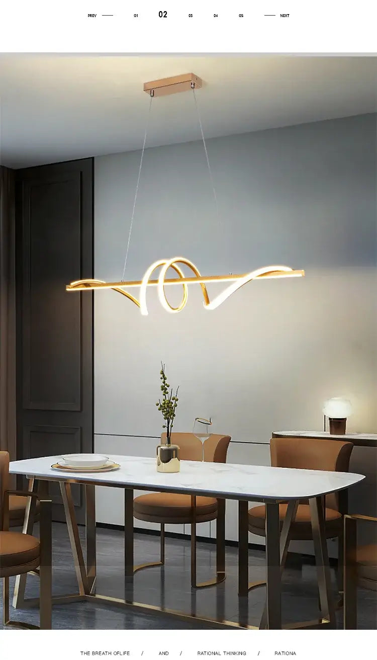 Modern minimalist pendant light hanging above a dining table in an elegant kitchen setting.